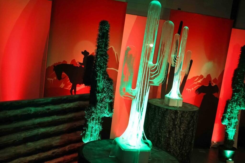 150 event theming ideas that you can truly pull off - cactus table centrepiece for a wild west event theme