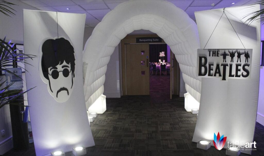 sixties-retro-event-theming-beatles-lit-arc-inflatable-tunnel